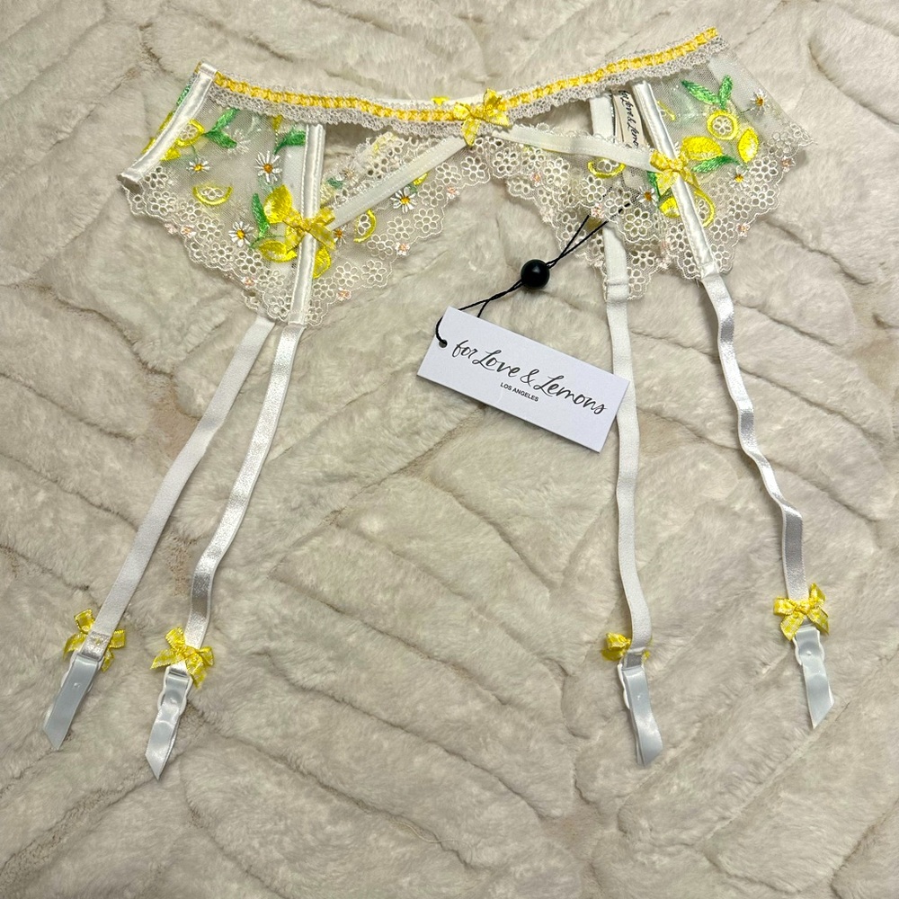 For Love and Lemons lemon daisy garter size small. Brand new, never worn.